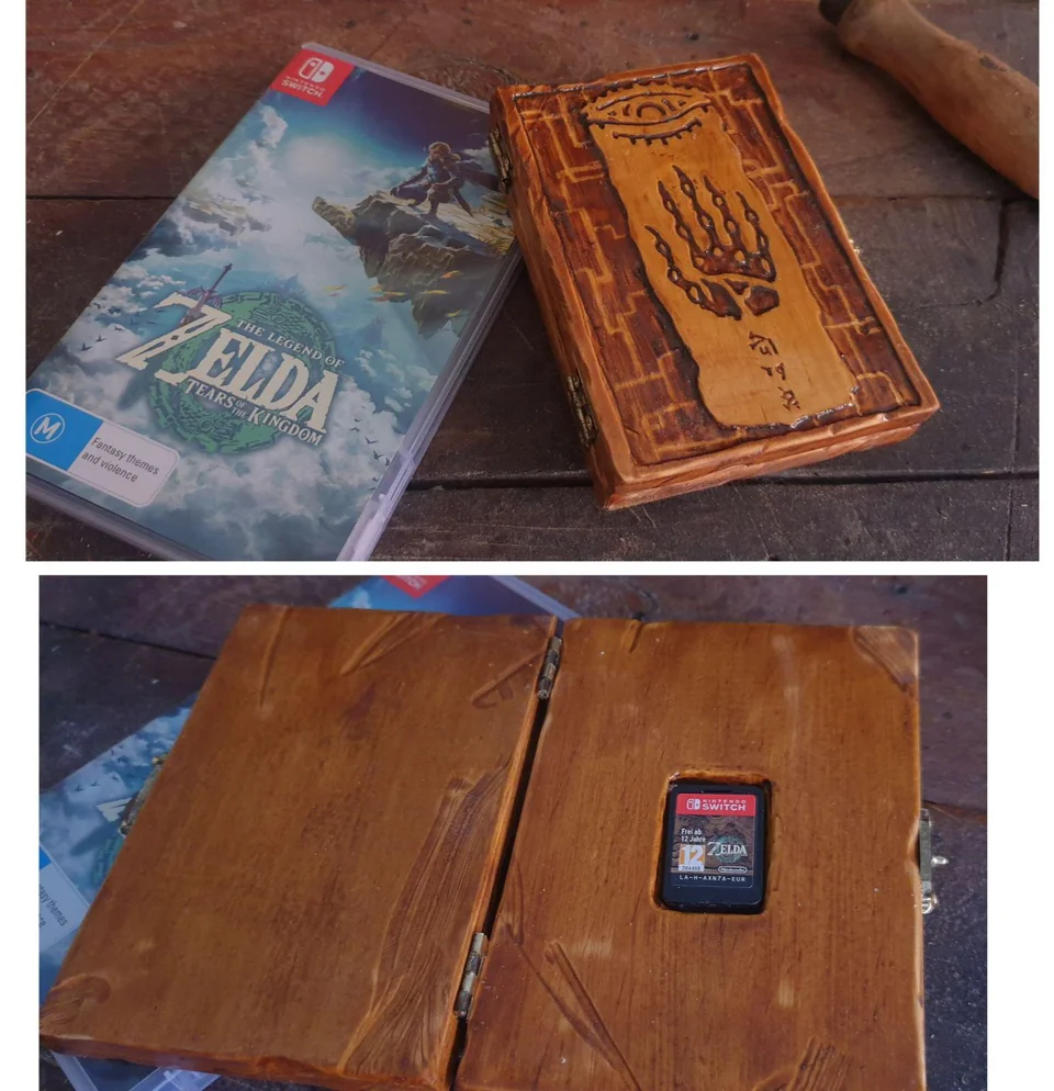 玩家FrigginBoomT认为Switch盒子看起来有点无趣，于是干脆自己亲手制作了一个《塞尔达传说：王国之泪》的......这也太有感觉了！
via twi FrigginBoomT#塞尔达王国之泪